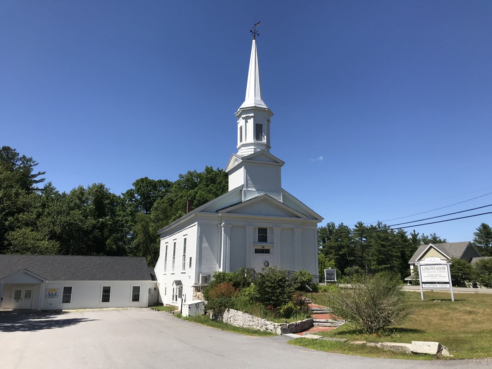 Longmeadow Congregational Church, a white church with a steeple, in Auburn, New Hampshire