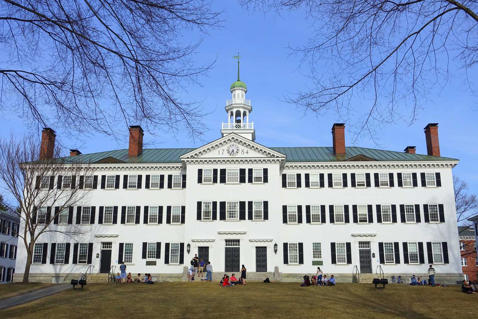 People on the lawn in front of Dartmouth Hall at Dartmouth College