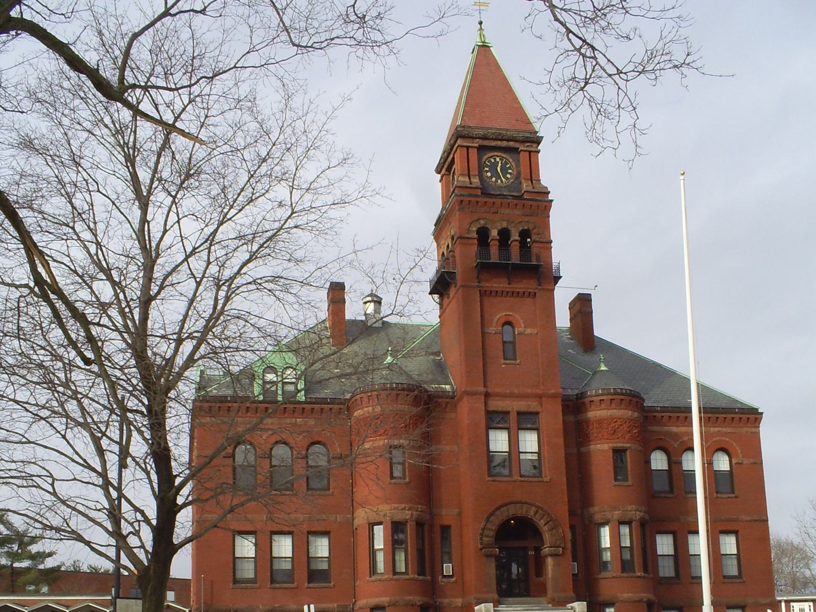 The red brick main building and clock tower of Pinkerton Academy in Derry, New Hampshire