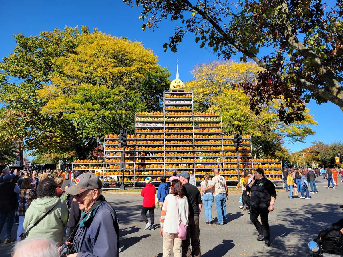 Crowd around the pumpkin tower at the Keene Pumpkin Festival